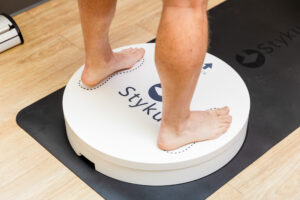 Man standing on Styku Body Composition Device as a part of our weight loss program near Madison, NJ.